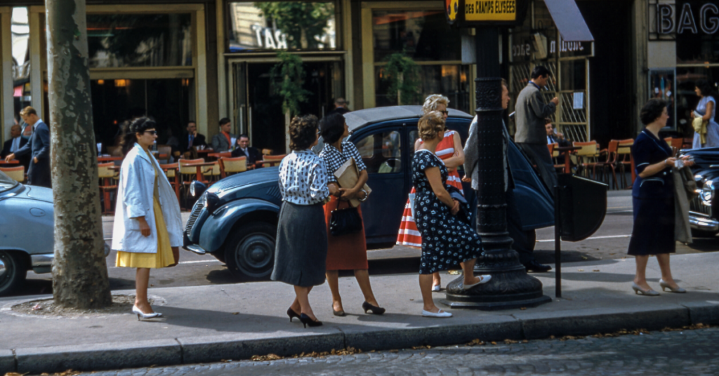 Women waiting on median